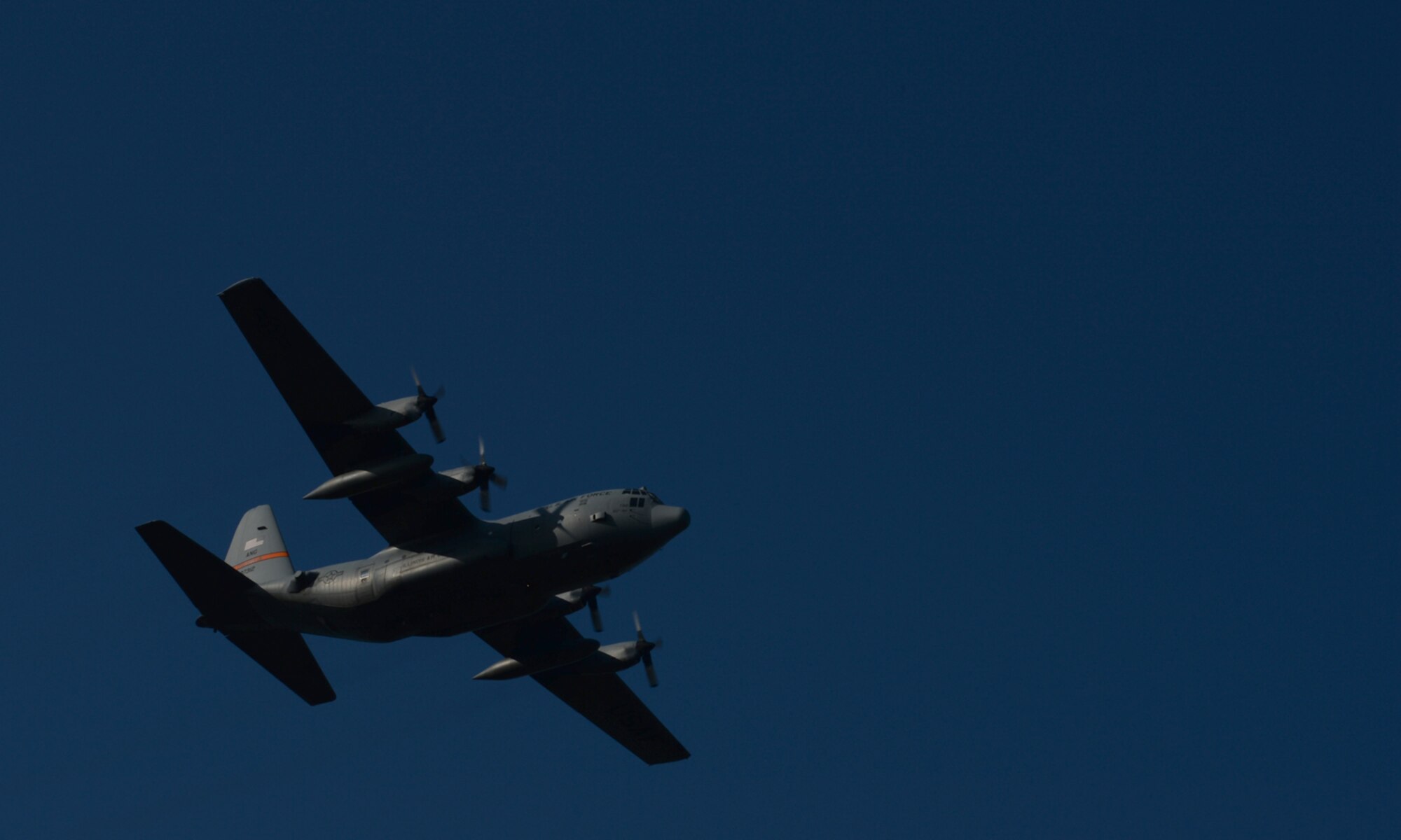A U.S. Air Force C-130 Hercules cargo aircraft assigned to the 182nd Airlift Wing, Illinois Air National Guard, Peoria, Ill., participates in a “turkey shoot” training mission Oct. 24, 2014, at Powidz Air Base, Poland. Roughly50 Airmen and three C-130s from the 182nd AW were involved in bilateral training with the Polish air force hosted by U.S. Air Force Aviation Detachment 1, 52nd Operations Group, Lask Air Base, Poland. (U.S. Air Force photo by Airman 1st Class Dylan Nuckolls/Released)