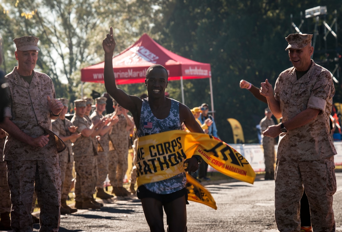 Civilians and members of the U.S. Armed Forces participate in the 39th Annual Marine Corps Marathon in Washington, D.C., Oct. 27, 2014. Known as "The People's Marathon," the 26.2 mile race, rated the third largest marathon in the United States, drew 30,000 participants. (U.S. Marine Corps photo by Staff Sgt. Ezekiel R. Kitandwe/Released)