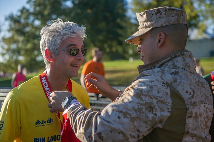 Civilians and members of the U.S. Armed Forces participate in the 39th Annual Marine Corps Marathon in Washington, D.C., Oct. 27, 2014. Known as "The People's Marathon," the 26.2 mile race, rated the third largest marathon in the United States, drew 30,000 participants. (U.S. Marine Corps photo by Cpl Ian M. Bush/ Released)