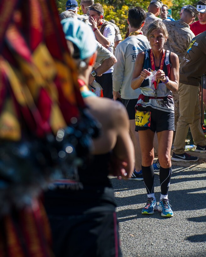 Civilians and members of the U.S. Armed Forces participate in the 39th Annual Marine Corps Marathon in Washington, D.C., Oct. 27, 2014. Known as "The People's Marathon," the 26.2 mile race, rated the third largest marathon in the United States, drew 30,000 participants. (U.S. Marine Corps photo by Cpl Ian M. Bush/ Released)