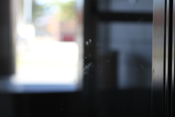 The unexplained handprints of children appear each morning on the windows of the Enlisted Club at Misawa Air Base, Japan.  (U.S. Air Force photo/Dr. Richard Clark)