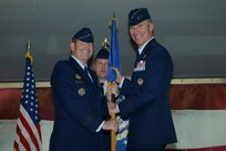 Gen. Robin Rand (left), commander of Air Education and Training Command, passes the guidon to Maj. Gen. Michael Keltz, commander of the 19th Air Force, during the 19th Air Force assumption of command ceremony at Joint Base San Antonio-Randolph Oct. 24. (U.S. Air Force photo by Joel Martinez)