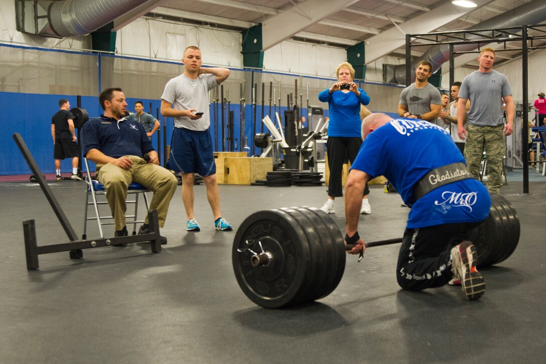 Leslie Steele, retired Army major, prepares to deadlift 365 pounds during the 2nd Annual Premier Strongman Challenge at the West Fitness Center on Joint Base Andrews, Md., Oct. 28, 2014. Steele, 47, took pride in being the oldest member of the competition. (U.S. Air Force photo/Airman 1st Class Ryan J. Sonnier)