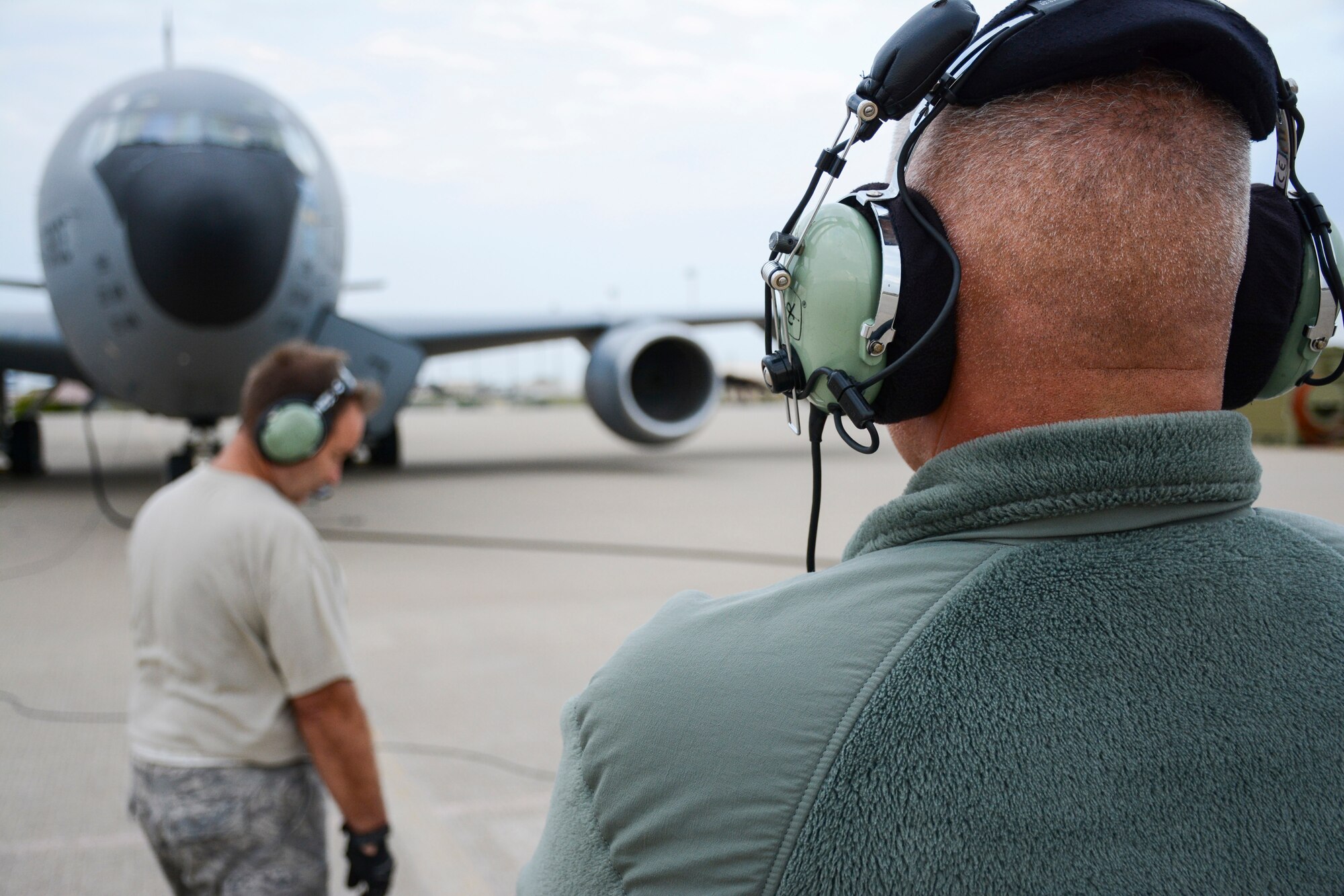 Master Sgt. Eric Whitesel, foreground, stands by as pilots prepare the 507th Air Refueling Wing KC-135R Stratotanker for engine start.  Whitesel and Tech. Sgt. Jeffrey Nash, 507th Aircraft Maintenance Squadron, prepared the tanker for takeoff during the Global Thunder exercise Oct. 24 here.  Flight crews remained on alert during the exercise in preparation for no notice missions.  Global Thunder is an annual exercise led by U.S. Strategic Command.  Its purpose is to demonstrate the capability to generate aircraft for the nuclear enterprise.  (U.S. Air Force photo/Senior Airman Mark Hybers)