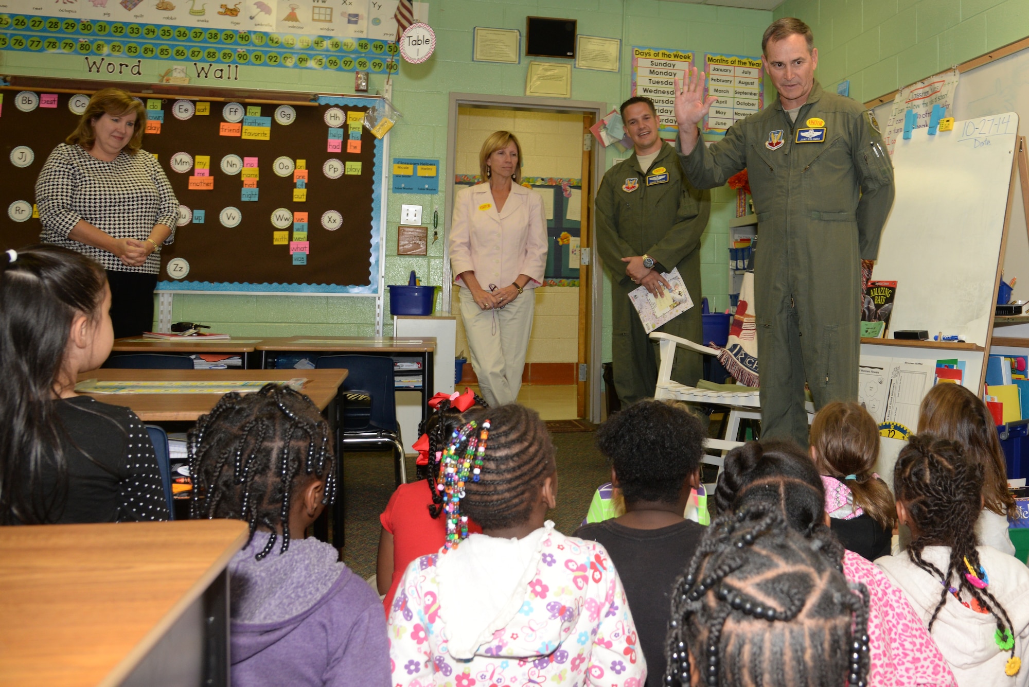 U.S. Air Force Maj. Gen. H.D. Polumbo Jr., Ninth Air Force commander, speaks to a group of first grade students at Alice Drive Elementary School, Sumter, S.C., Oct. 27, 2014. Polumbo, his wife, Sandra, and Maj. Mark Skalko, Ninth Air Force commander’s action group chief, read to kindergarteners and first graders at Alice Drive Elementary School in an effort to inspire children to appreciate reading. (U.S. Air Force photo by Airman 1st Class Jonathan Bass/Released)