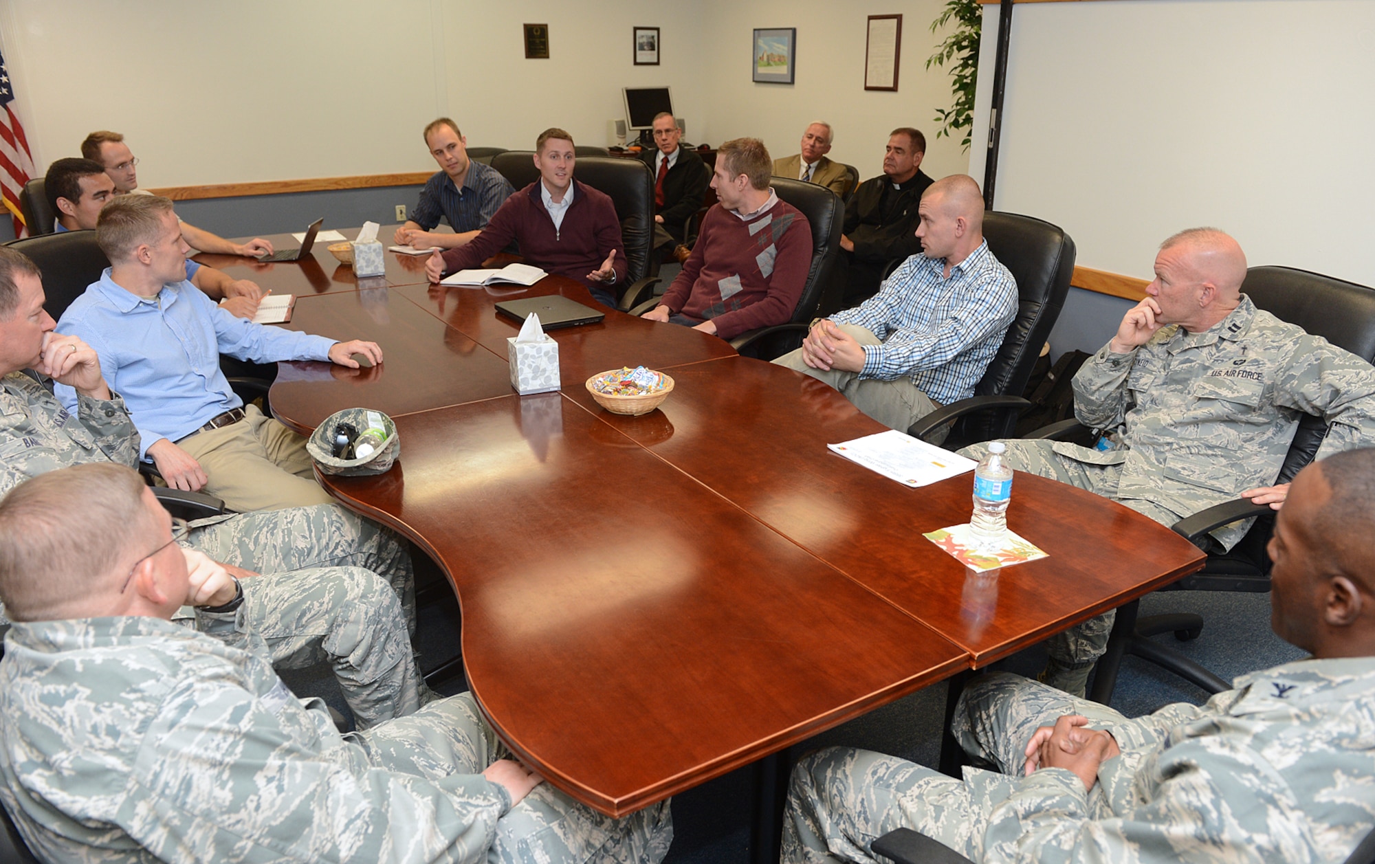 Graduate students from Brigham Young University visit with Col. Ron Jolly, 75th Air Base Wing and Installation commander, Oct. 24 at Hill Air Force Base to gain a commander’s perspective on the purpose of military chaplains. (Air Force photo by Alex R. Lloyd)