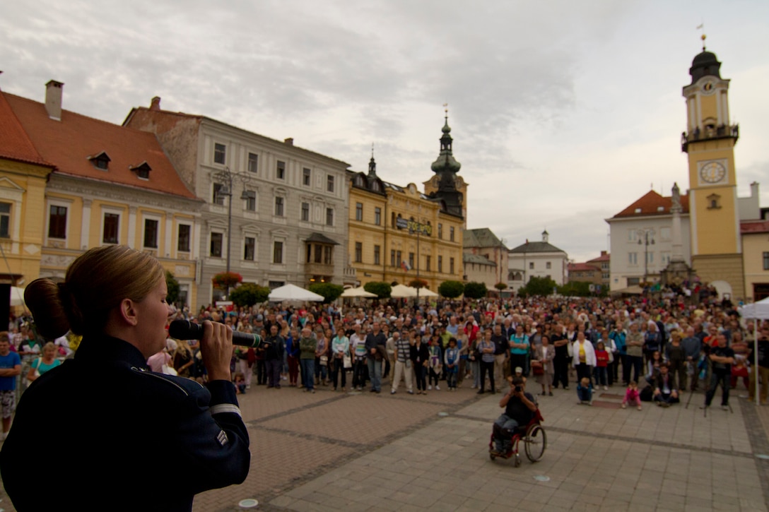 Recently the USAFE band performed in various locations in Slovakia to celebrate the 70th anniversary of  the Slovak National Uprising. Senior Airman Melissa Lackore sings "Freedom" during a performance  commemorating  the celebration.  (U.S. Air Force photo by Technical Sergeant Nick Wellman/Released)