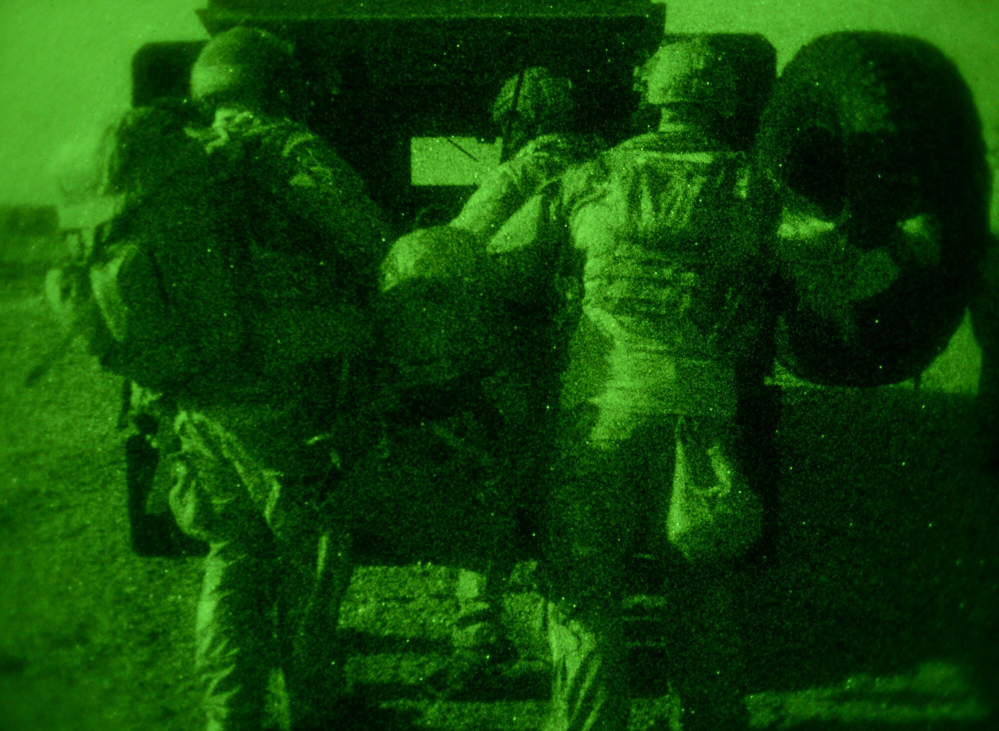 U.S. Air Force Air Commandos load a simulated injured hostage into a Humvee Oct. 9, 2014, at Stanford Training Area near Thetford, England. Air Commandos practiced life saving skills on simulated patients to hone their skills. (U.S. Air Force photo by Airman 1st Class Kyla Gifford/Released)