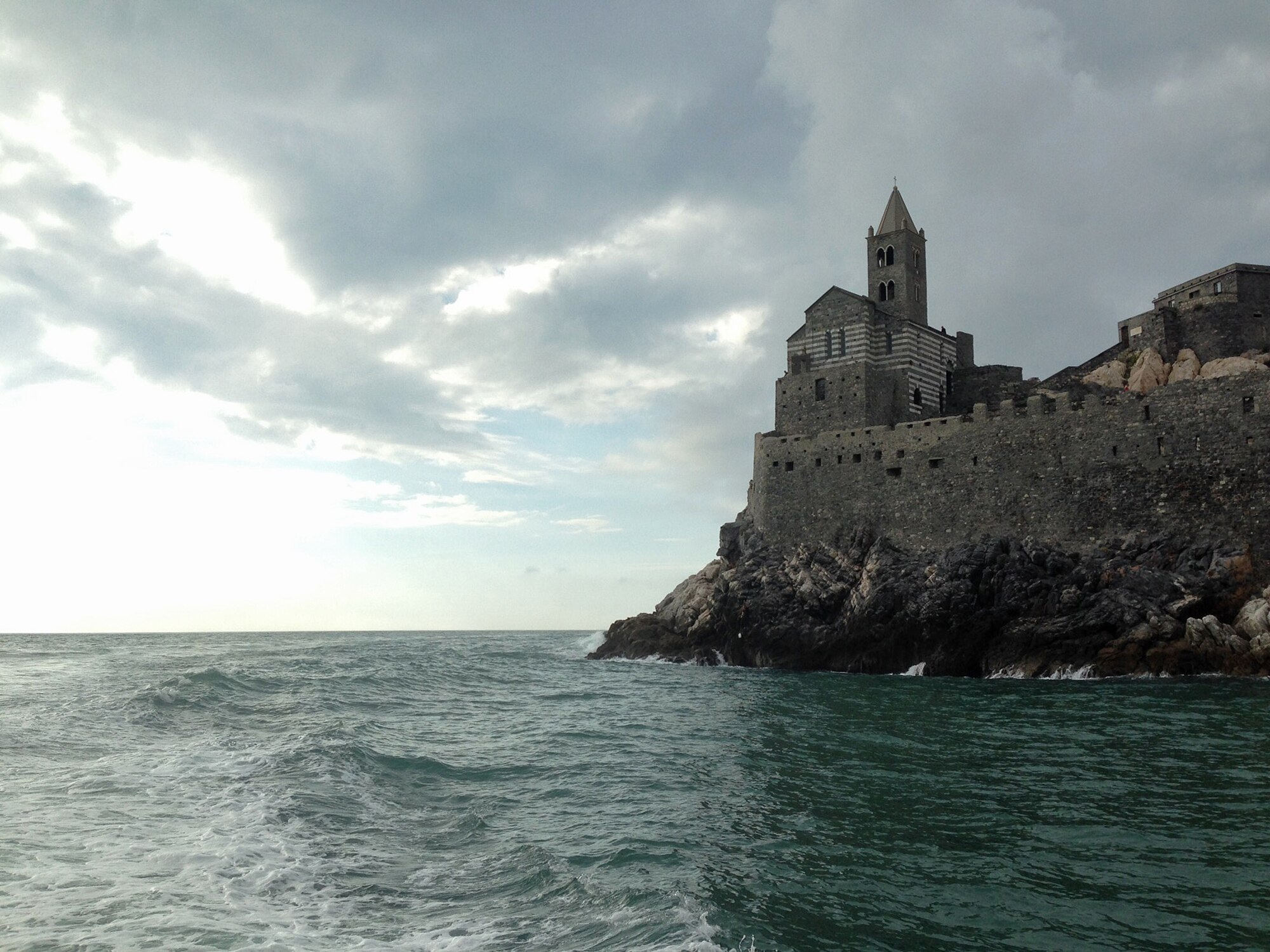 The Church of St. Peter in Porto Venere, Italy, sits on top of a rocky coastline and dates back to the 12th Century. Just south of Cinque Terre, Porto Venere can only be reached by boat and is part of the Gulf of La Spezia, also known as the Gulf of Poets, for the many historic poets who passed through the town. (U.S. Air Force photo/Staff Sgt. Jessica Hines) 