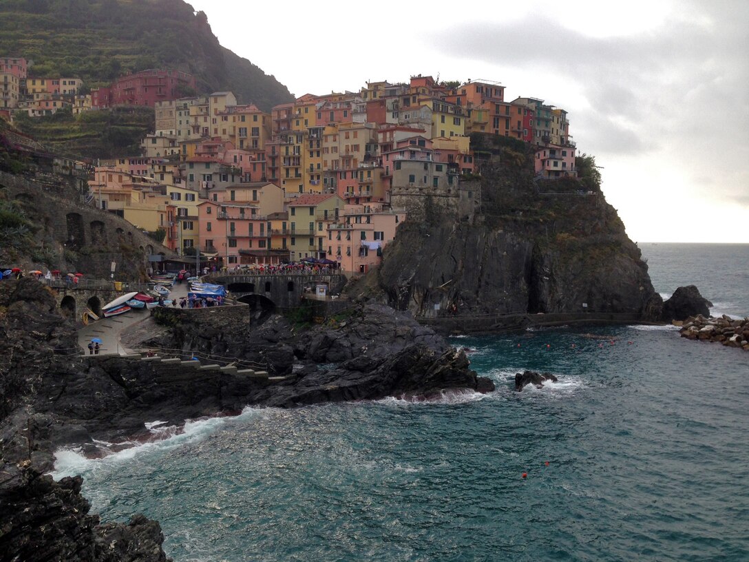 The bright colorful homes tucked into the hillside of Manarola, the second smallest coastline village of the Cinque Terre region in northern Italy. As one of the oldest towns in the area, Manarola depends on a steady stream of tourism, fishing and wine making as primary revenue. (U.S. Air Force photo/Senior Airman Michael Battles)