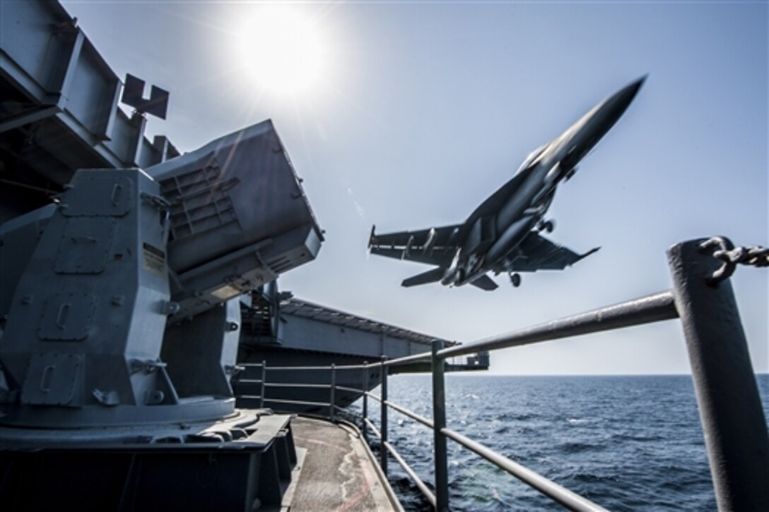 An F/A-18 Super Hornet launches from the flight deck of the aircraft carrier USS Carl Vinson as the ship conducts flight operations in support of Operation Inherent Resolve in the U.S. 5th Fleet area of operations, Oct. 27, 2014.