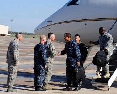 U.S. Navy Adm. Cecil D. Haney, U.S. Strategic Command commander, center right, is greeted by U.S. Air Force Brig. Gen. Glen D. VanHerck, 509th Bomb Wing commander, center left, on the Whiteman Air Force Base flightline, Oct. 30, 2014. Haney visited Whiteman to chair the Bomber Stakeholders Conference, one of several stakeholders meetings held this year.  These forums are designed to assess the health and direction of the Nation's strategic forces, including bomber, intercontinental ballistic missile and submarine forces, as well as the communication networks and sensors that tie them all together. (U.S. Air Force photo by Airman 1st Class Keenan Berry)