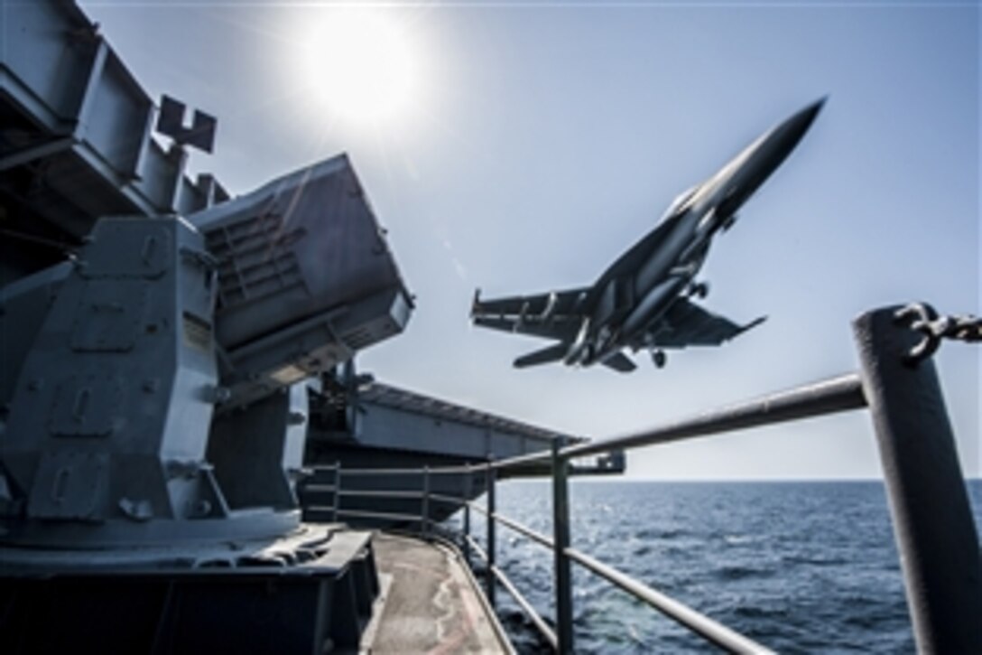 An F/A-18 Super Hornet launches from the flight deck of the aircraft carrier USS Carl Vinson as the ship conducts flight operations in support of Operation Inherent Resolve in the U.S. 5th Fleet area of operations, Oct. 27, 2014. 