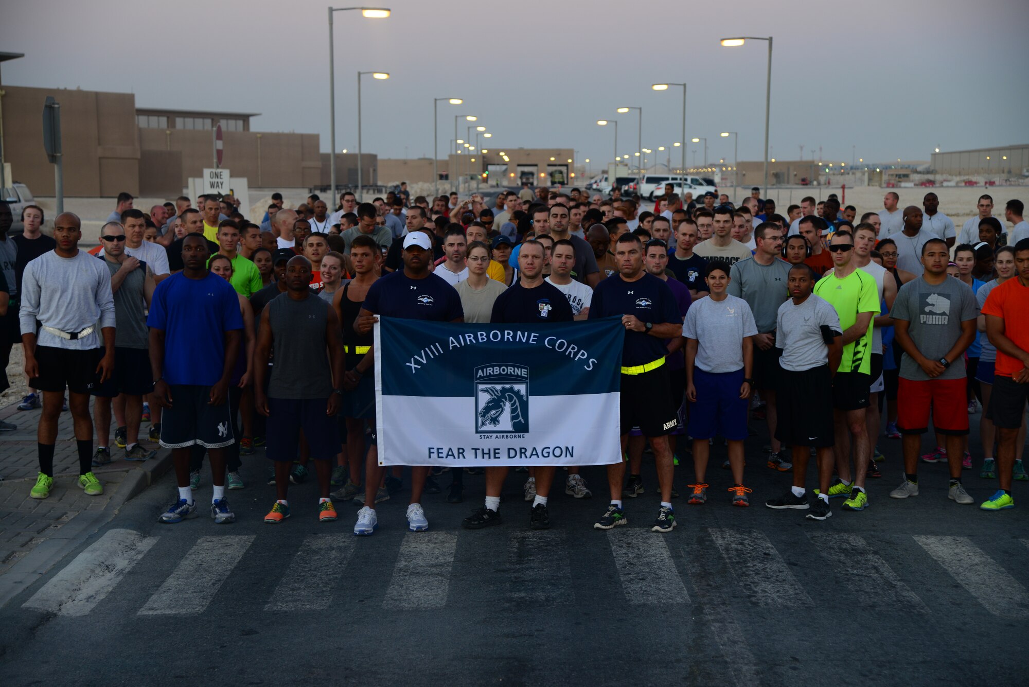 Grand Slam servicemembers, deployed to Al Udeid Air Base, Qatar, did a warrior run, October 25, in honor of two fallen comrades, who died while supporting Operation Enduring Freedom.  The servicemembers honored are Major Michael Donahue and Sergeant First Class Matthew Leggett, who were assigned to the 18th Airborne Corps at Fort Bragg, S.C. (U.S. Air Force photo by Staff Sgt. Ciara Wymbs)