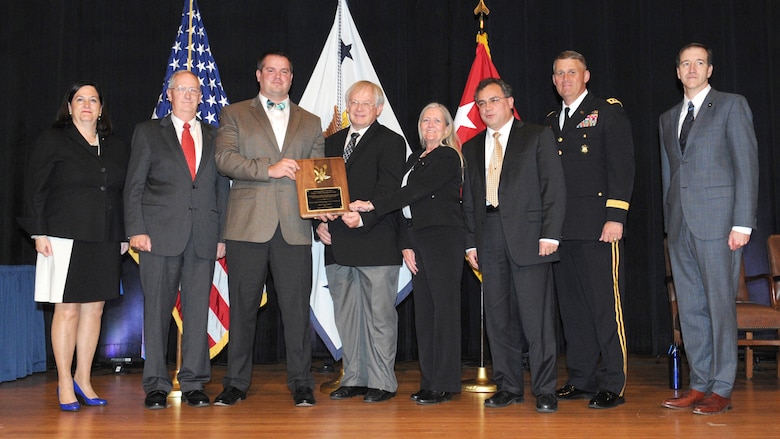 Hon. Katherine Hammack, assistant secretary of the Army for Installations, Energy and Environment; Huntsville Center ESPC team members Michael Norton, chief of the Energy Implementation Branch; Will Irby, program manager for the Energy Savings Performance Contracting Program; Bruce Forsberg, a mechanical engineer for the ESPC team; Margaret Simmons, command counsel; Paul Robinson, Energy Division chief; Lt. Gen. David Halverson, assistant chief of staff for Installation Management; and Mr. Richard Kidd, deputy assistant secretary of the Army for Energy and Sustainability, at the ceremony Oct. 29.