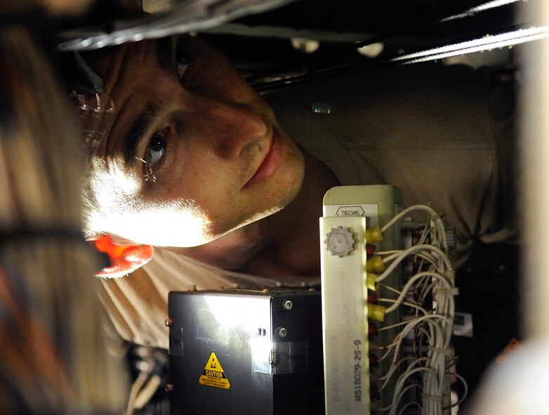 Staff Sgt. Robert McLendon, 1st Special Operations Equipment Maintenance Squadron aircraft structural maintainer, inspects an MC-130P Combat Shadow on Hurlburt Field, Fla., Oct. 29, 2014. The structural maintainers work in confined spaces to ensure the structural integrity of a MC-130P Combat Shadow is sound. (U.S. Air Force photo/Airman 1st Class Andrea Posey)