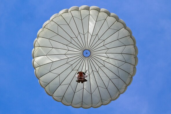 U.S. Army Reserve Maj. Russell Anderson floats down to the ground Oct. 24, 2014, after jumping from a C-130 Hercules over the Coyle Drop Zone, N.J. The C-130 is assigned to the Delaware Air National Guard's 166th Airlift Wing. Anderson is from the 404th Civil Affairs Battalion (Airborne). (U.S. Air National Guard photo/Tech. Sgt. Matt Hecht)