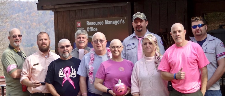 Mike Estock, Matt Slezak, Rodney Williams, Kevin Nogroski, Jim Stark, Suzanne Estock, Bill Younkin, Nancy Abbott, Rick Miller, Cody Covey show off their colors in support of National Breast Cancer Month.