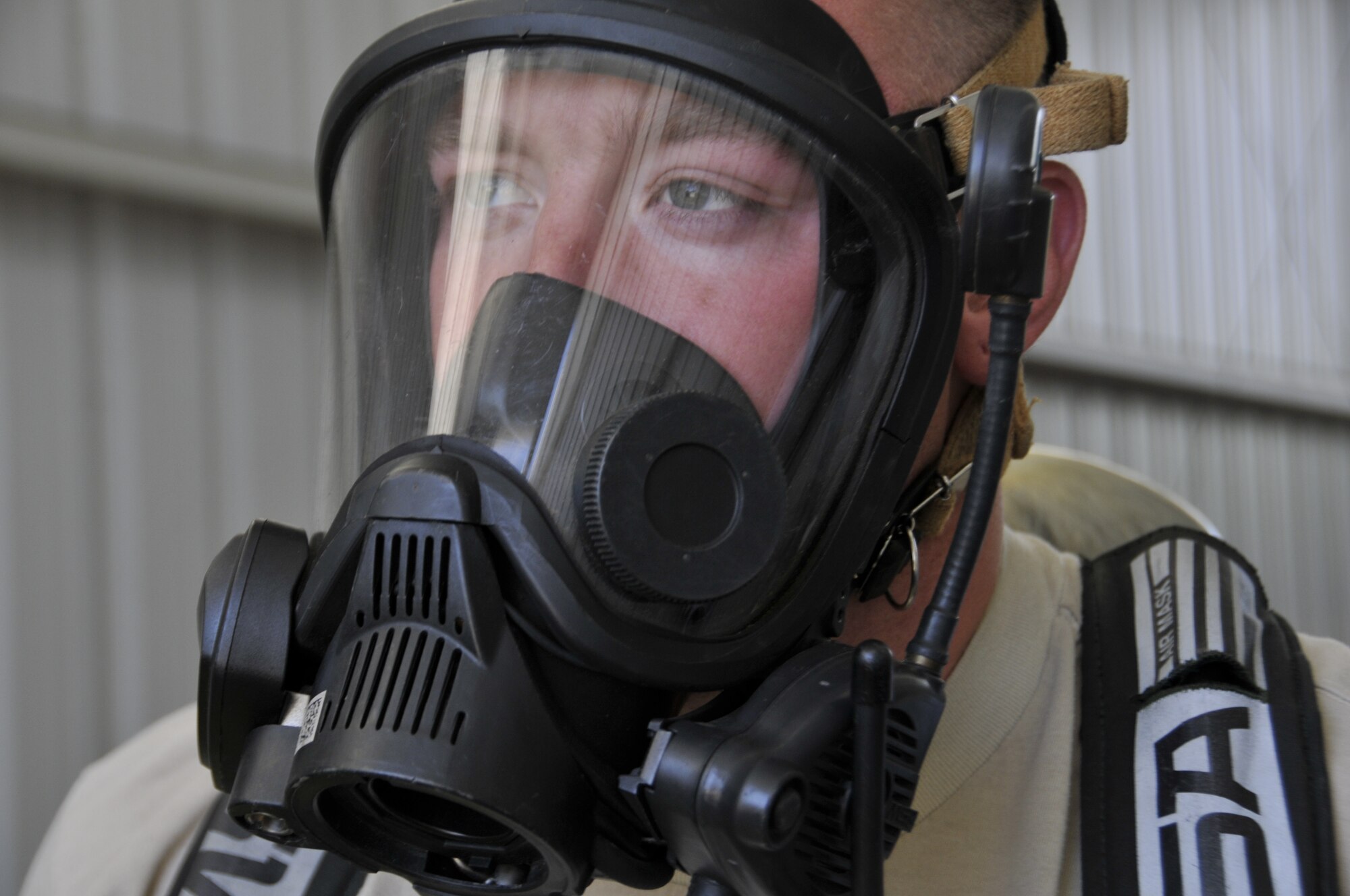 Emergency management specialists with the 188th Civil Engineering Squadron work to identify and clean up hazardous material spills during a training  exercise at Ebbing Air National Guard Base, Fort Smith, Ark., Oct. 4. (U.S. Air National Guard photo by Staff Sgt. John Suleski/released)