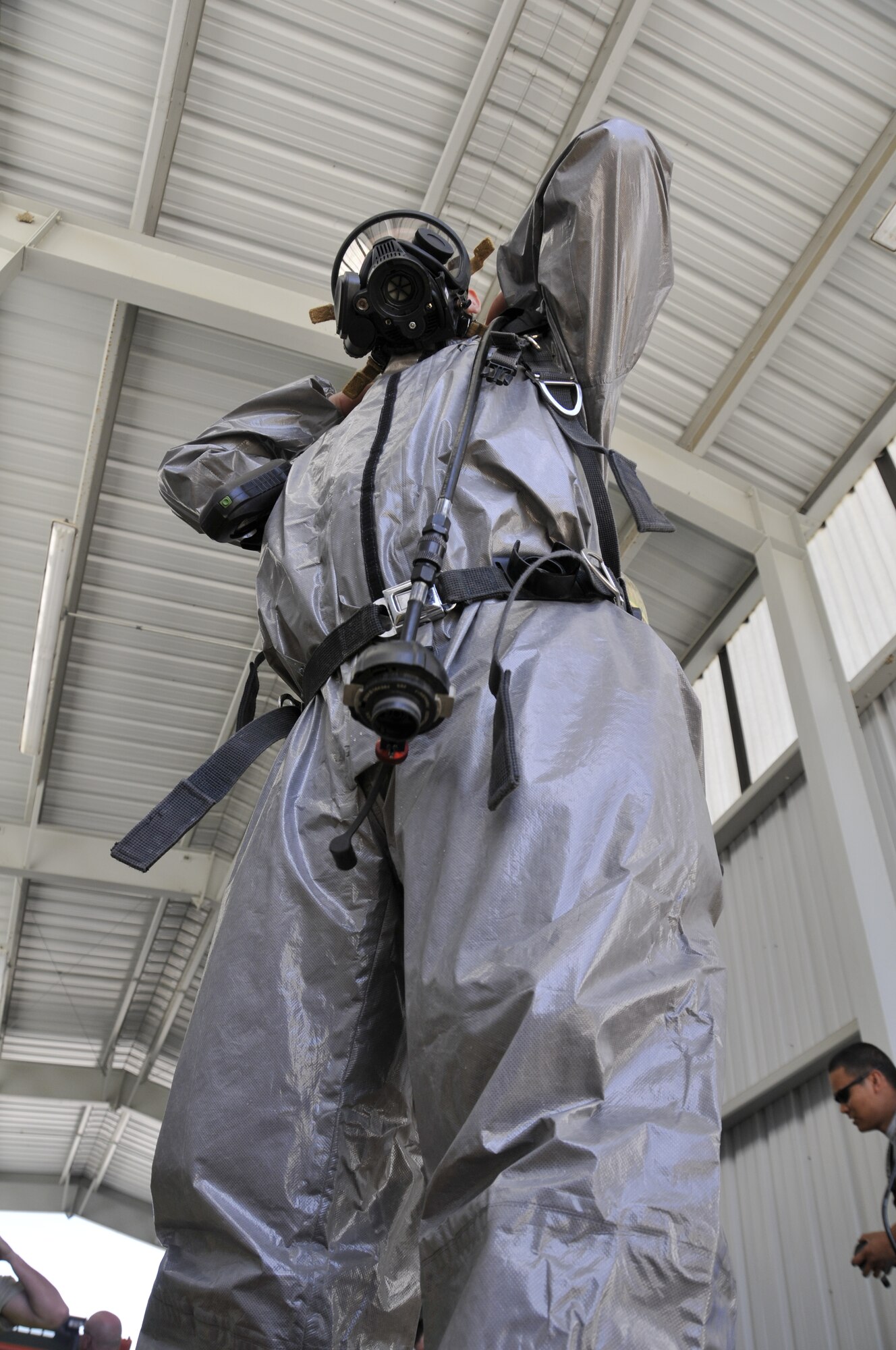 Emergency management specialists with the 188th Civil Engineering Squadron work to identify and clean up hazardous material spills during a training  exercise at Ebbing Air National Guard Base, Fort Smith, Ark., Oct. 4. (U.S. Air National Guard photo by Staff Sgt. John Suleski/released)