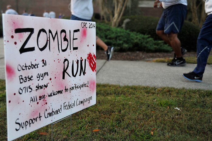 It was a scary morning as Team Charleston personnel participated in the Joint Base Charleston Combined Federal Campaign Zombie Run Oct. 31, 2014, at JB Charleston, S.C. The 1.7 mile run forced runners to dodge zombies in three "contaminated" areas in order to "survive." (U.S. Air Force photo/Staff Sgt. Renae Pittman)