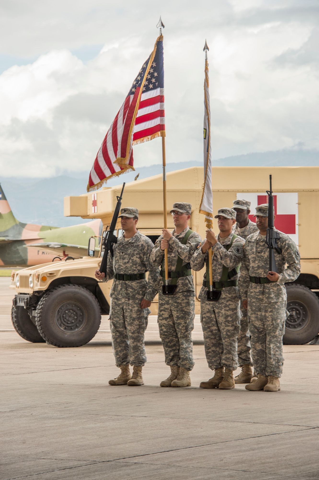 The Joint Task Force-Bravo’s Medical Element Color Guard posts the colors for the Transfer of Authority Ceremony between the 228th Combat Support Hospital and the 94th Combat Support Hospital on Soto Cano Air Base, Honduras, Oct. 31, 2014.  Over the past two weeks the 228th CSH prepared the 94th CSH to take over their U.S. Southern Command mission.  The JTF-B MEDEL is the only forward deployed medical asset with and enduring presence within SOUTHCOM.  MEDEL provides medical support to DoD beneficiaries in garrison at Soto Cano AB, as well as supporting SOUTHCOM’s humanitarian assistance and disaster relief efforts.  (U.S. Air Force photo/Tech. Sgt. Heather Redman)