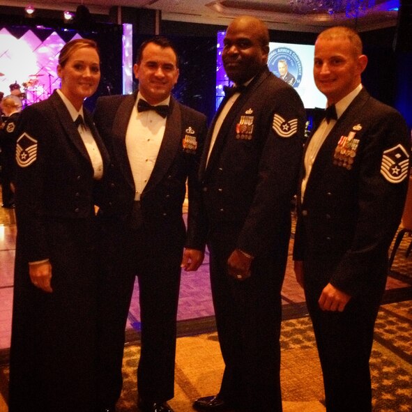 U.S. Air Force Master Sgt. Jacqueline Haro, Master Sgt. Steven Haro, Tech. Sgt. Phillip Mackey, and Master Sgt. Mark Diehl pose for a photo at the Air Force Sergeants Association Convention and Professional Airman Conference (PAC) Aug. 20, 2014 at Jacksonville, Fla. AFSA Chapter 460 won five awards at the 2014 AFSA Division 2 Competition at Fort Walton Beach, Fla. (Courtesy photo)