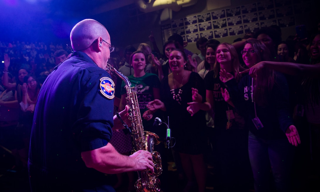 Master Sgt. Tyler Selden, a saxophonist with the U.S. Air Force Heritage of America Band Full Spectrum, plays during a performance Oct. 29, 2014, at West Ashley High School in Charleston, S.C. Featuring members with vast musical knowledge and extensive performance resumes, Full Spectrum was created for an Air Force Heritage of America Band deployment to Southwest Asia in May 2013. After months performing in forward operating environments for U.S. and coalition troops and building International partnerships, they are now bringing their deployed experiences to audiences up and down the East Coast from South Carolina to Maine. (U.S. Air Force photo/Airman 1st Class Clayton Cupit)