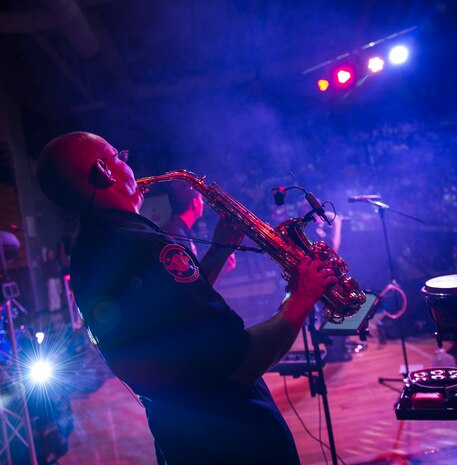 Master Sgt. Tyler Selden, a saxophonist with the U.S. Air Force Heritage of America Band Full Spectrum, plays during a performance Oct. 29, 2014, at West Ashley High School in Charleston, S.C. Featuring members with vast musical knowledge and extensive performance resumes, Full Spectrum was created for an Air Force Heritage of America Band deployment to Southwest Asia in May 2013. After months performing in forward operating environments for U.S. and coalition troops and building international partnerships, they are now bringing their deployed experiences to audiences up and down the East Coast from South Carolina to Maine. (U.S. Air Force photo/Airman 1st Class Clayton Cupit)