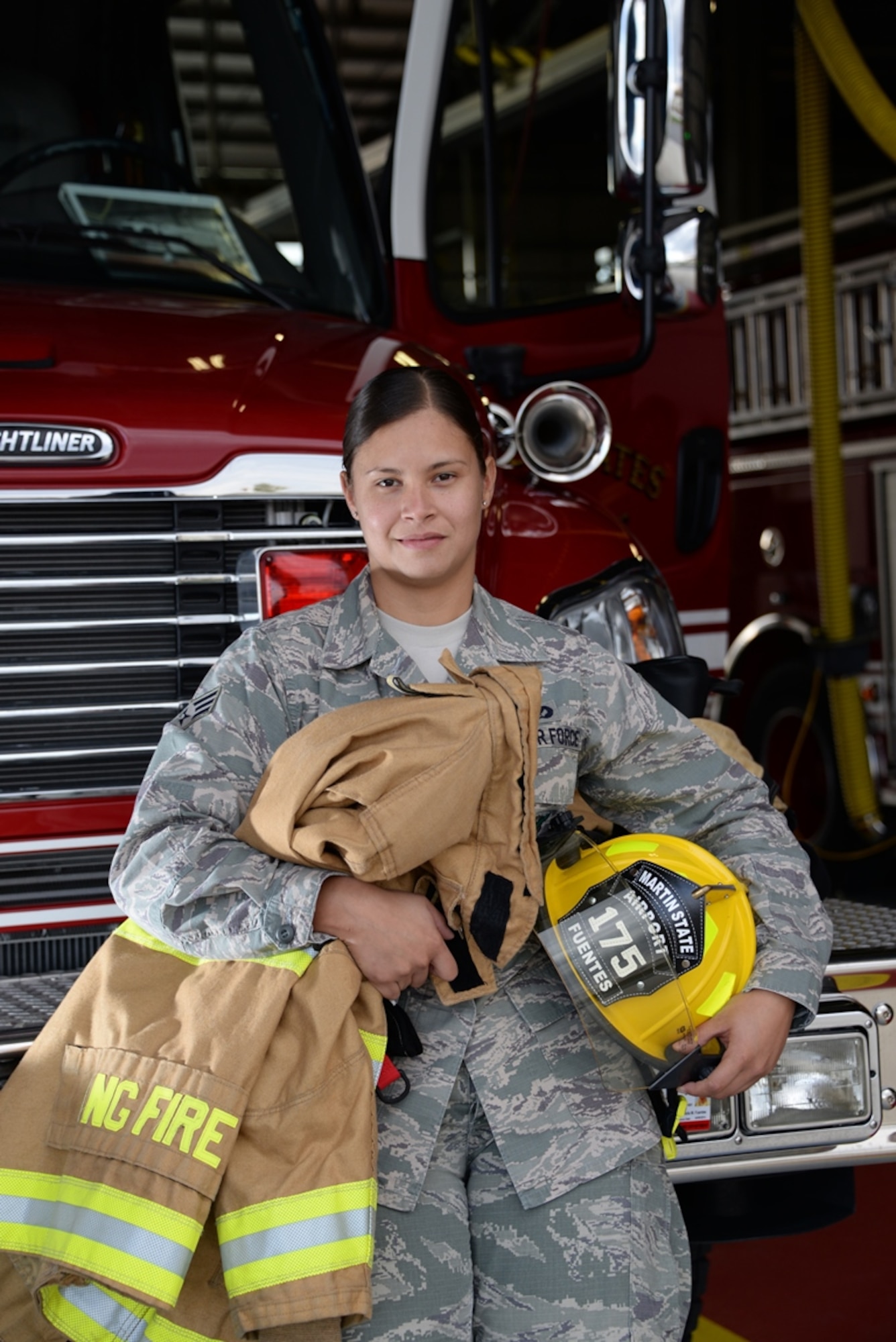 Senior Airman Sheila M. Fuentes is a full-time firefighter at Warfield Air National Guard Base; she left her unit and home in Puerto Rico to pursue a career in firefighting in the Maryland Air National Guard. (U.S. Air National Guard photo by Senior Master Sgt. Ed Bard/RELEASED)