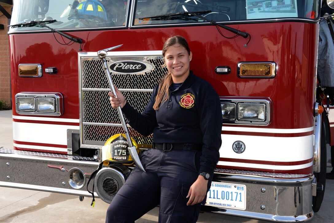 Senior Airman Sheila M. Fuentes is a full-time firefighter at Warfield Air National Guard Base; she left her unit and home in Puerto Rico to pursue a career in firefighting in the Maryland Air National Guard. (U.S. Air National Guard photo by Senior Master Sgt. Ed Bard/RELEASED)