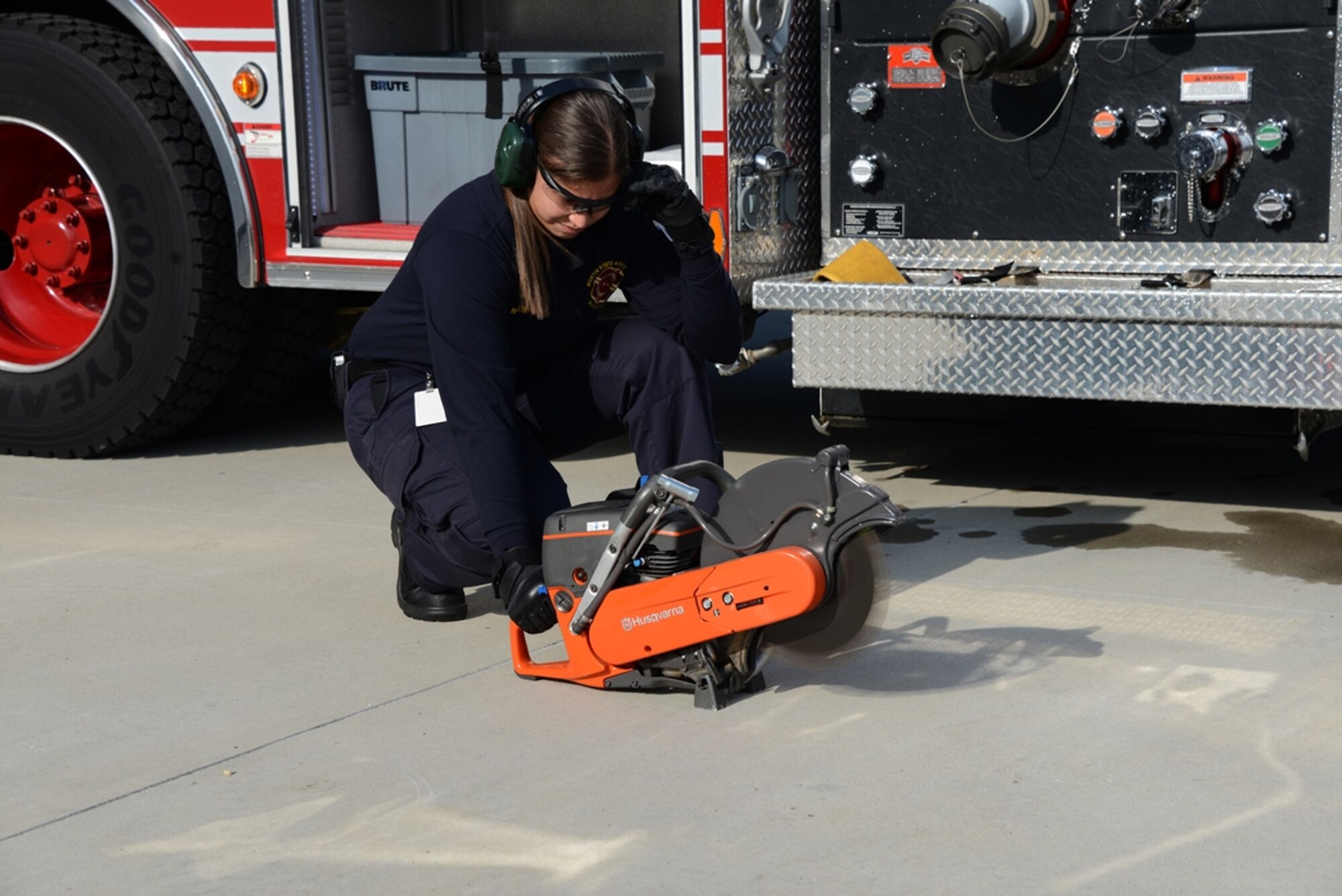 Senior Airman Sheila M. Fuentes is a full-time firefighter at Warfield Air National Guard Base; she left her unit and home in Puerto Rico to pursue a career in firefighting in the Maryland Air National Guard. (U.S. Air National Guard photo by Senior Master Sgt. Ed Bard/RELEASED)