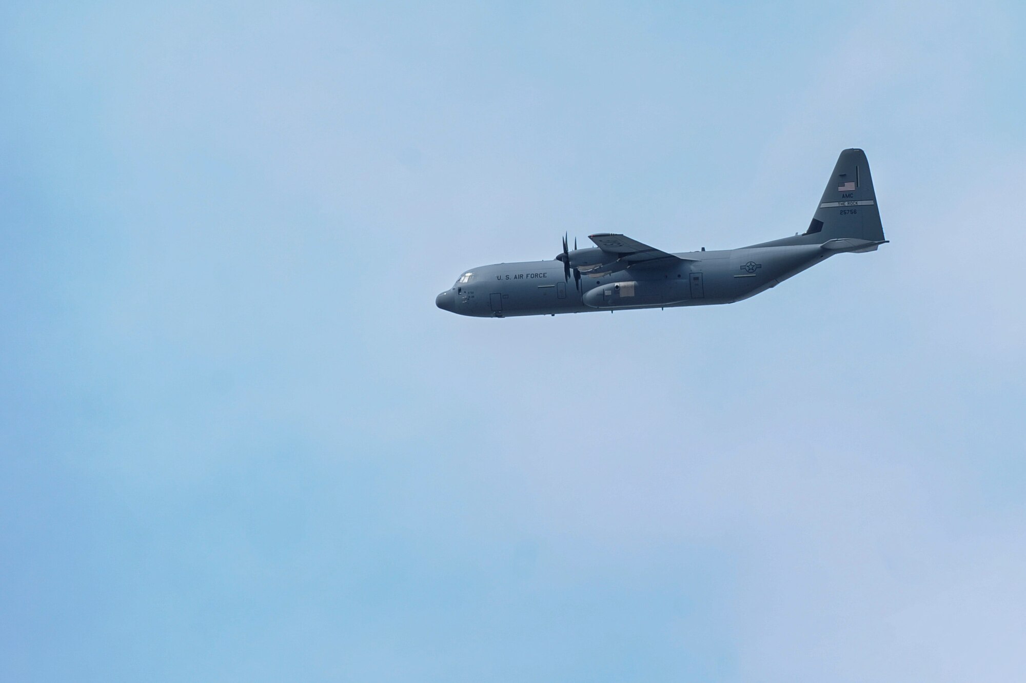Maj. Gen. Mike Stough, Headquarters Air Mobility Command director of strategic plans, requirements and programs, flies the Air Force's newest C-130J over Little Rock Air Force Base, Ark., Oct. 23, 2014, at Little Rock Air Force Base, Ark. This C-130J was delivered to the 61st Airlift Squadron, the ninth to join the squadron in the past two years. (U.S. Air Force photo by Airman 1st Class Cliffton Dolezal)