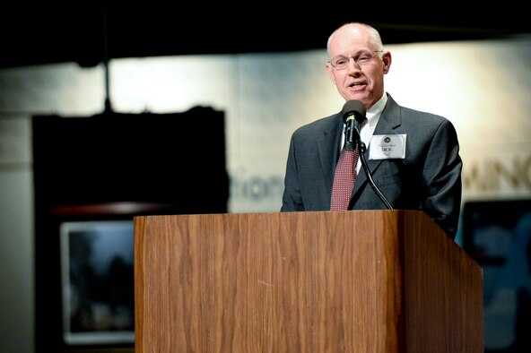 Retired Air Force Maj. Gen. Dick Paul delivers keynote address during the Air Force Research Laboratory 2014 Fellows and Early Career Awards Banquet Oct. 30 at Wright-Patterson AFB, Ohio.  The event, held at the National Museum of the U.S. Air Force, honors the organization's top scientists and engineers. Maj. Gen. Paul served as AFRL's first commander from 1997 - 2000. (U.S. Air Force photo/Wesley Farnsworth)