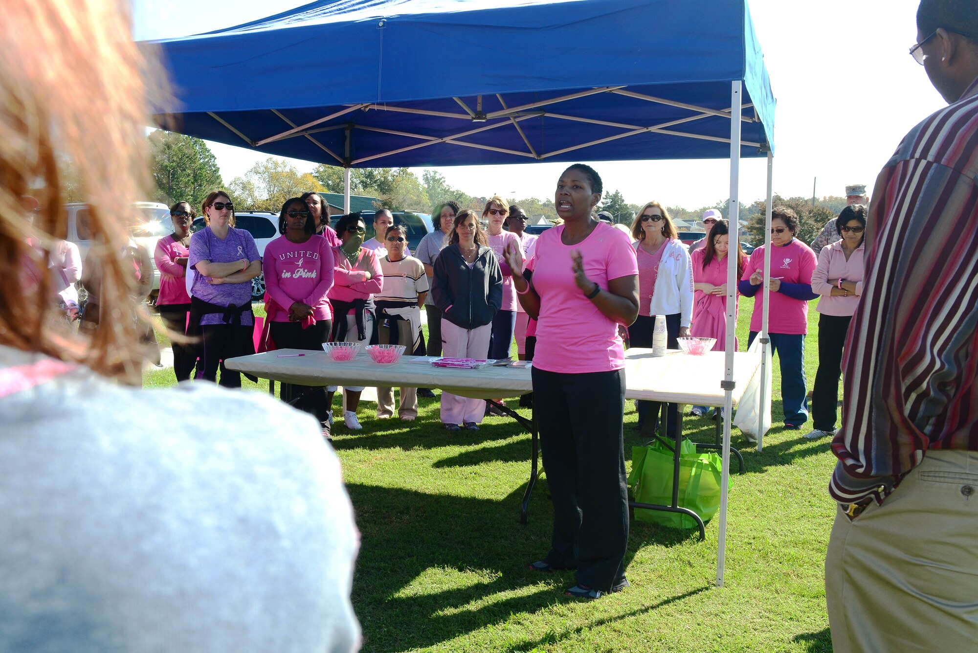 U.S. Army Maj. Tameka Bowser, Army Public Health Nursing chief, speaks before the Breast Cancer Awareness Month walk at Fort Eustis, Va., Oct. 30, 2014. Bowser thanked the group for supporting National Breast Cancer Awareness Month. (U.S. Air Force photo by Airman 1st Class Kimberly Nagle/Released)