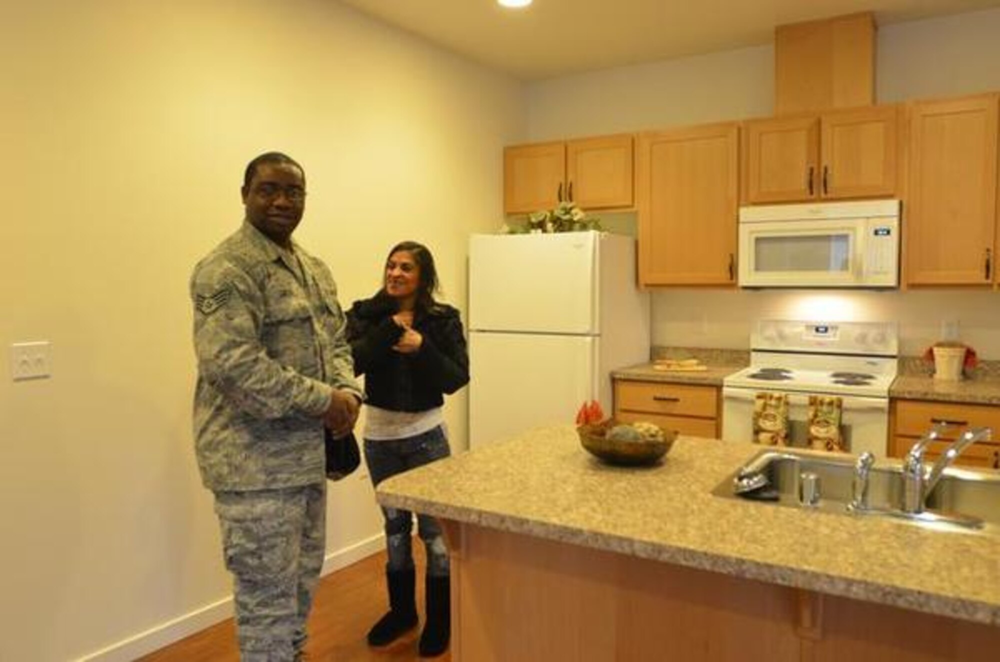 A ribbon cutting ceremony was held for the new Stony Oak housing community. Staff Sgt. Tony Green and Emmelina Fariley are the first homeowners to move in. (Northwest Guardian photo/Veronica Sandate Craker)