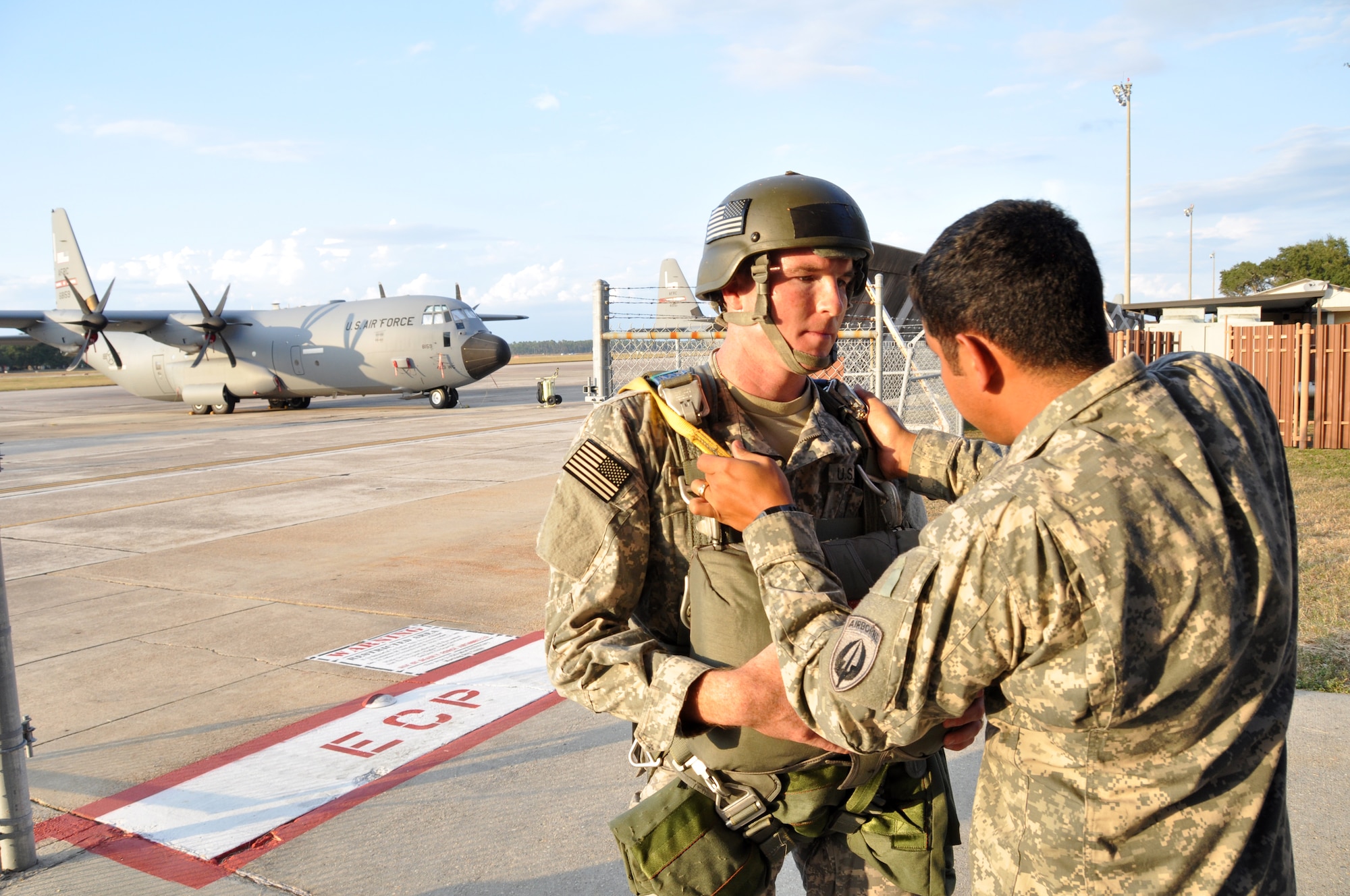 The 160th Special Operations Aviation Regiment paratroopers check their equipment before a jump out of an 815th Airlift Squadron C-130J to establish a Forward Army Refueling Point in support of the Operation Southern Strike exercise in South Mississippi Oct. 29, 2014. The 160th SOAR is headquartered in Fort Campbell, Kentucky. The 815th AS is an Air Force Reserve unit stationed at Keesler Air Force Base, Mississippi. (Master Sgt. Brian Lamar/U.S. Air Force photo)