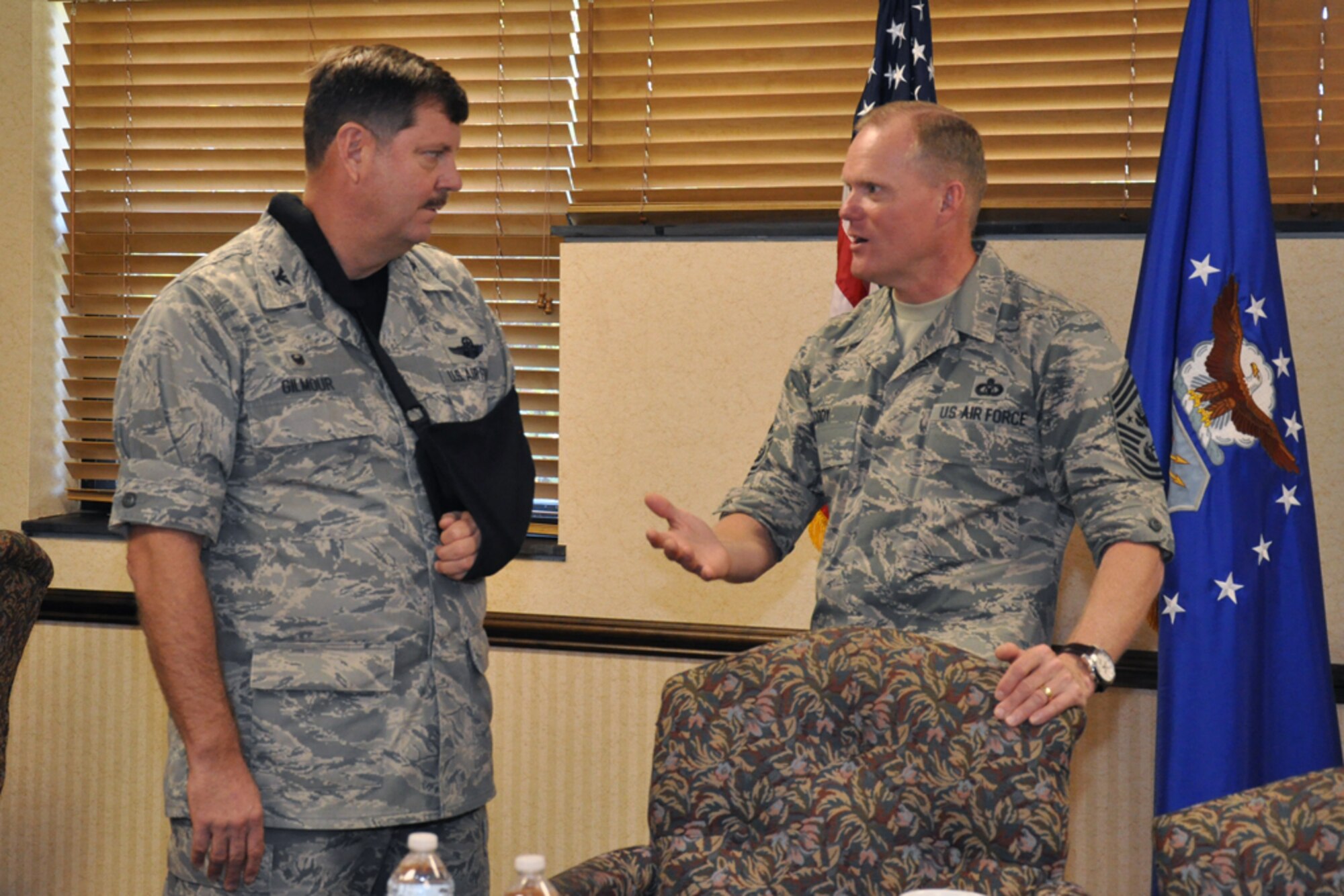 Chief Master Sgt. of the Air Force James Cody speaks with Col. Gregory Gilmour, 916th Air Refueling Wing commander, while visiting Seymour Johnson Air Force Base, North Carolina, Oct. 10. During the visit, Cody spent time with Airmen of the 916th ARW and its Total Force Associate partner, the 911th Air Refueling Squadron. (U.S. Air Force photo/Staff Sgt. Alan Abernethy)