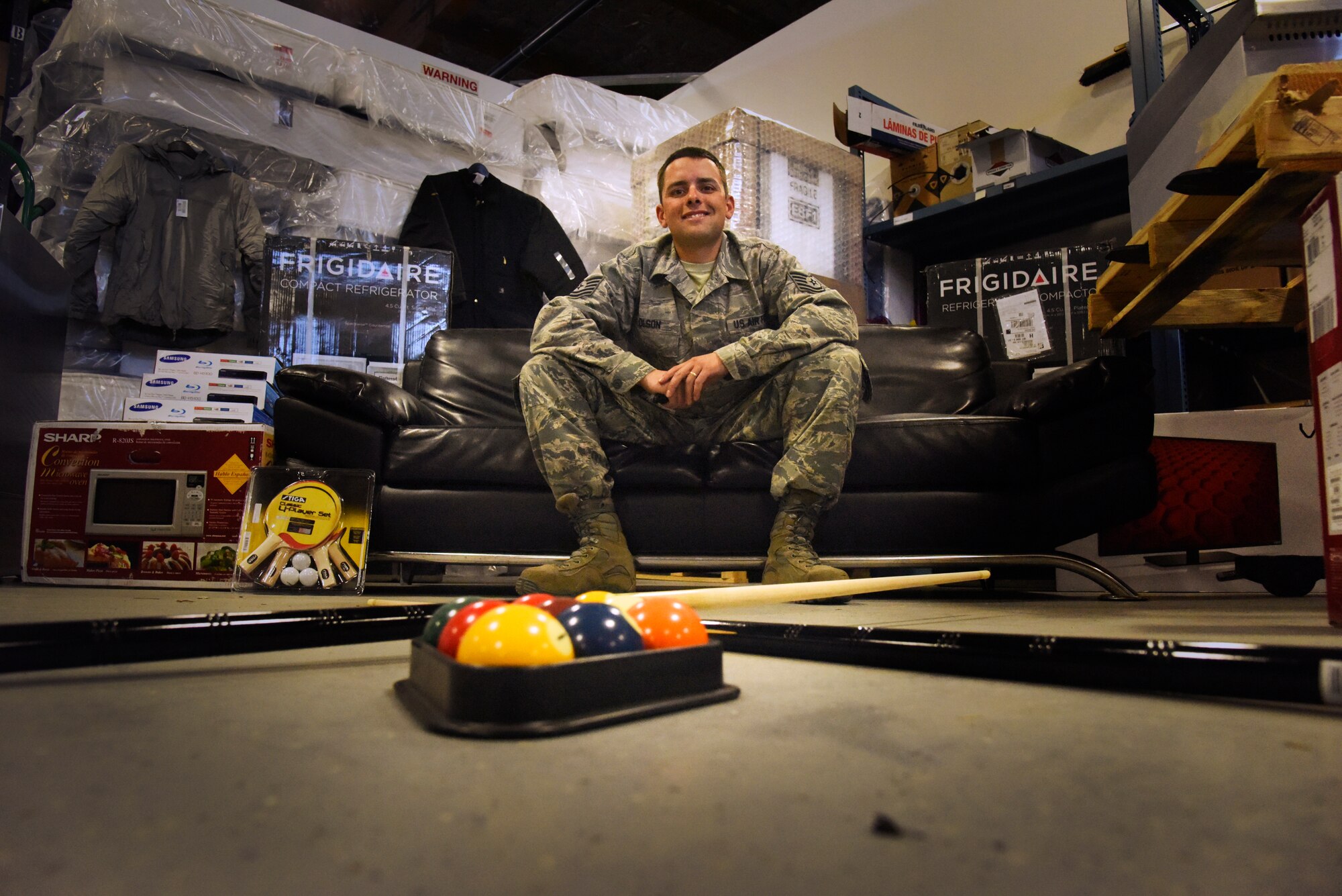 Tech. Sgt. Lee Olson, 341st Operations Group supply coordinator, poses for a photograph at the OG supply warehouse on Oct. 20. As part of his duties, Olson orders, inventories, stores, distributes and logs all Force Improvement Program related items, as well as every-day supplies.  (U.S. Air Force photo/Airman 1st Class Collin Schmidt) 