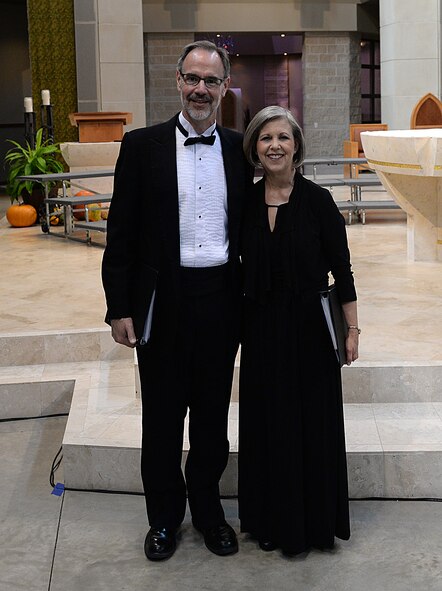 The Blice-Baums prepare for a performance in a local choral group called Masterworks Chorale. The Blice-Baums have been involved together in music throughout their 32 years of marriage. (U.S. Air Force photo/Senior Airman Joshua Eikren)