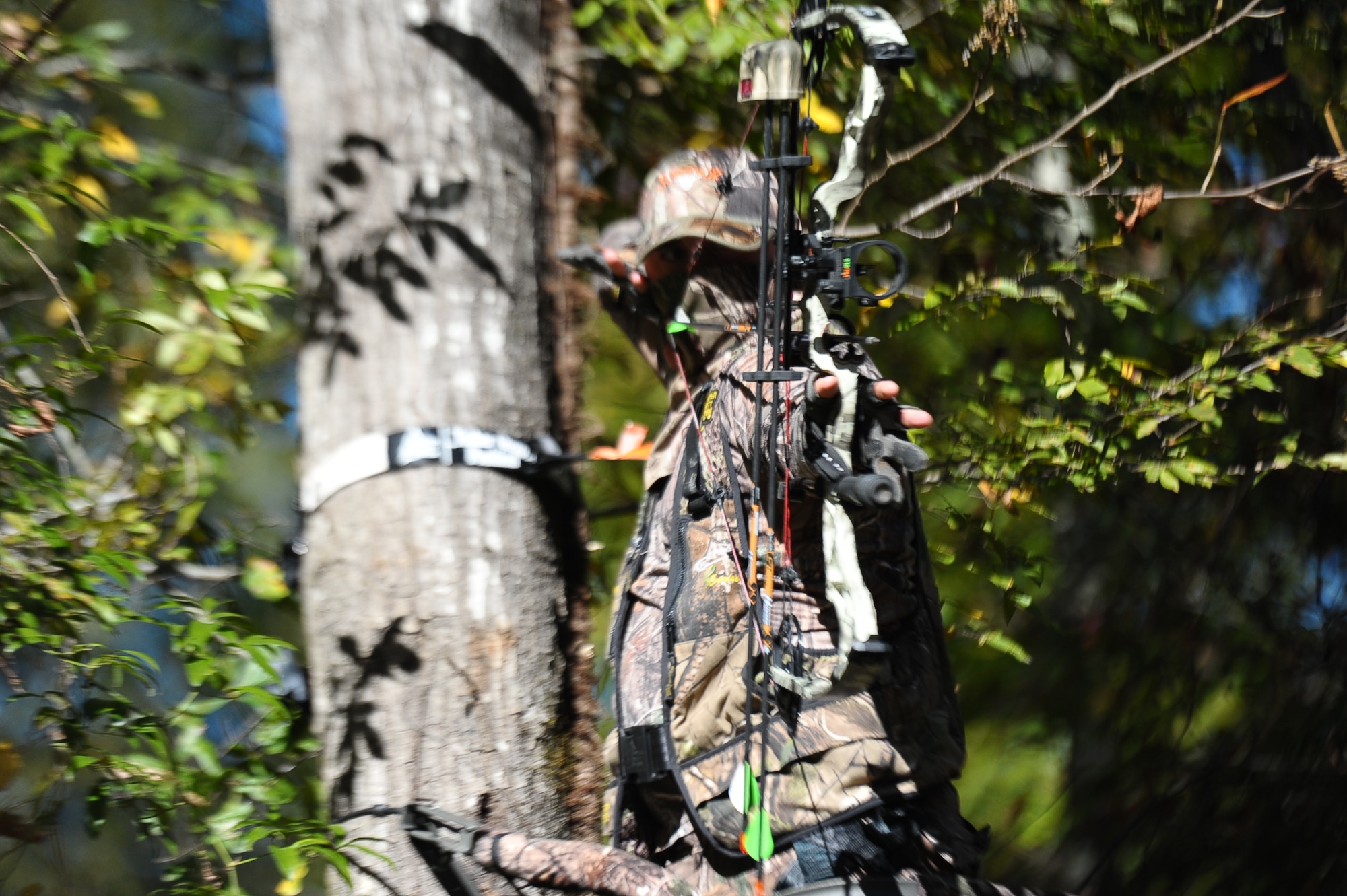 Staff Sgt. Cody Howk, 14th Operations Support Squadron Weather Forecaster, takes aim at a target with his bow Oct. 29 at Columbus Air Force Base. Airmen wanting to pursue the unique challenges of bow hunting have to be extremely careful not to spook the deer at such close range.(U.S. Air Force photo/ Airman Daniel Lile)