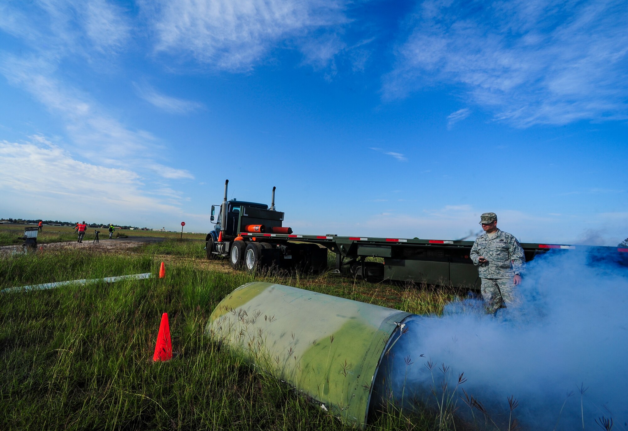 Tech. Sgt. James Shreve, 39th Maintenance Squadron quality assurance munitions inspector, test the smoke machine used to replicate an engine prop fire during a simulated aircraft mishap Oct. 30, 2014, at Incirlik Air Base, Turkey. The 39th Air Base Wing Inspector General Team coordinated the exercise to ensure Incirlik’s members are ready to respond to emergency situations. (U.S. Air Force photo by Airman Cory W. Bush/Released)