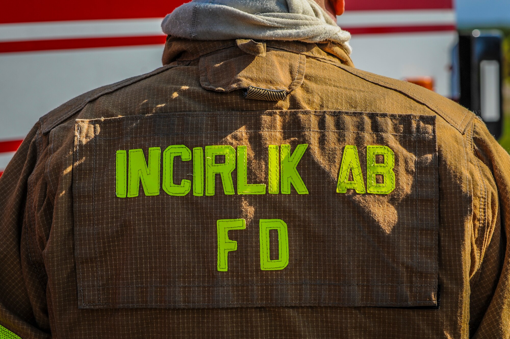 A firefighter from the 39th Civil Engineer Squadron Incirlik Fire Emergency Services, participates in a simulated aircraft mishap Oct. 30, 2014, at Incirlik Air Base, Turkey. Incirlik Fire Emergency Services consist of more than 80 personnel with a goal to provide the best response capabilities during emergency situations. (U.S. Air Force photo by Airman Cory W. Bush/Released)