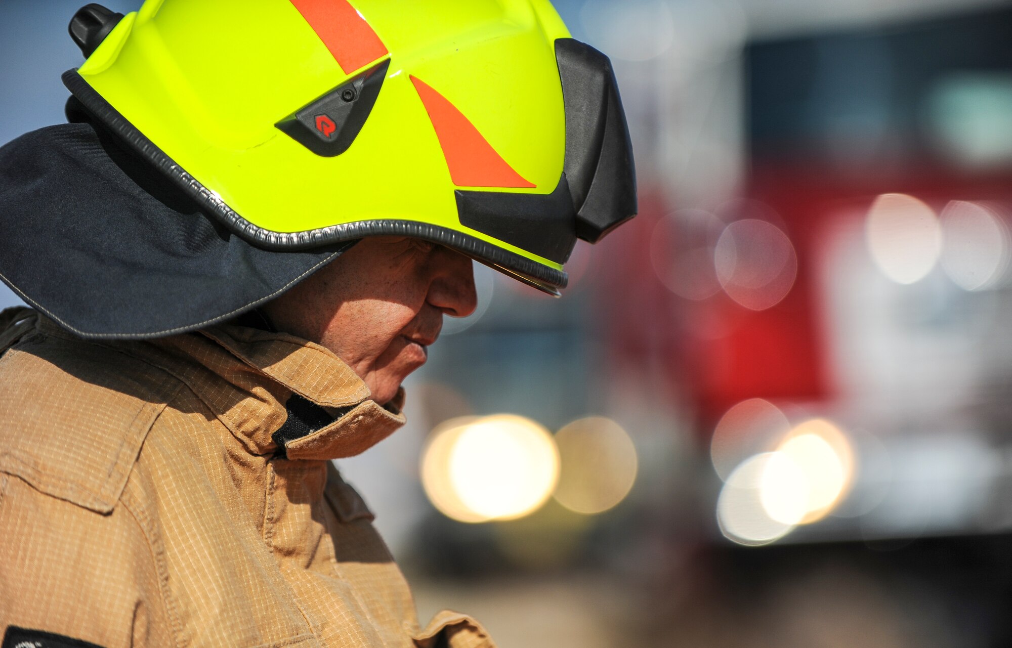 Malik Kucuk, 39th Civil Engineer Squadron driver operator, respond to a simulated aircraft mishap Oct. 30, 2014, at Incirlik Air Base, Turkey. Aircraft fires are one of many services the base firefighters are qualified to respond to in emergencies. (U.S. Air Force photo by Airman Cory W. Bush/Released)