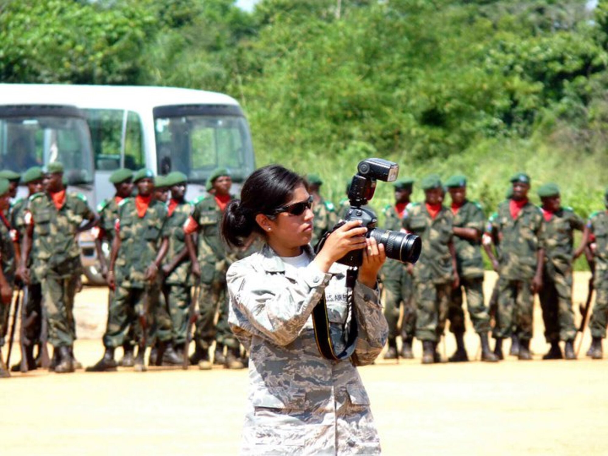 Senior Airman Christine Fink takes photos during her deployment to Africa in 2010. Fink is a member of the Comanche tribe. (Courtesy Photo)