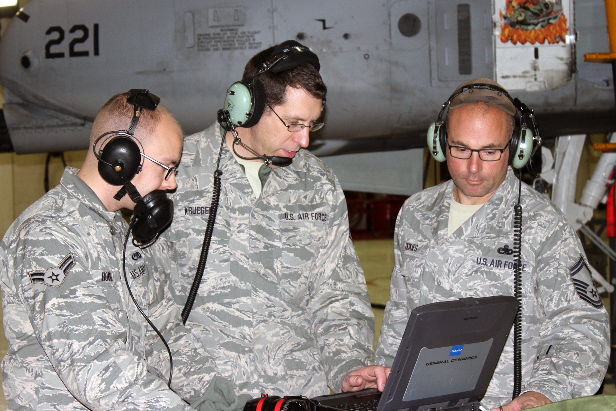 141030-Z-VA676-026 – Airman 1st Class Travis Bowman, Staff Sgt. Karl Krueger and Senior Master Sgt. David Fickies review technical data during a systems test on an A-10 Thunderbolt II aircraft at Selfridge Air National Guard Base, Mich., Oct. 30, 2014. The three Airmen are members of the avionics shop of the 127th Aircraft Maintenance Squadron, Michigan Air National Guard. (U.S. Air National Guard photo by Tech. Sgt. Dan Heaton/Released)