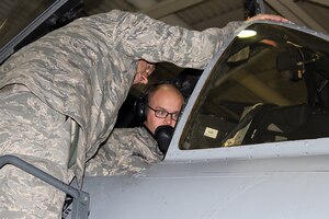 141030-Z-VA676-014 -- Staff Sgt. Karl Krueger instructs Airman 1st Class Travis Bowman as the two perform a systems test on an A-10 Thunderbolt II aircraft at Selfridge Air National Guard Base, Mich., Oct. 30, 2014. The two Airmen are members of the avionics shop of the 127th Aircraft Maintenance Squadron, Michigan Air National Guard. (U.S. Air National Guard photo by Tech. Sgt. Dan Heaton/Released)
