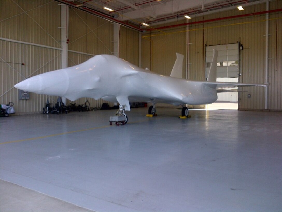 Atlantic Shrink Wrapping Inc. shrink wraps an F-15A Eagle for storage while a permanent location for this static display is selected and built.
(U.S. Air National Guard Photo by Chief Master Sgt. Wayne Brown/Released)