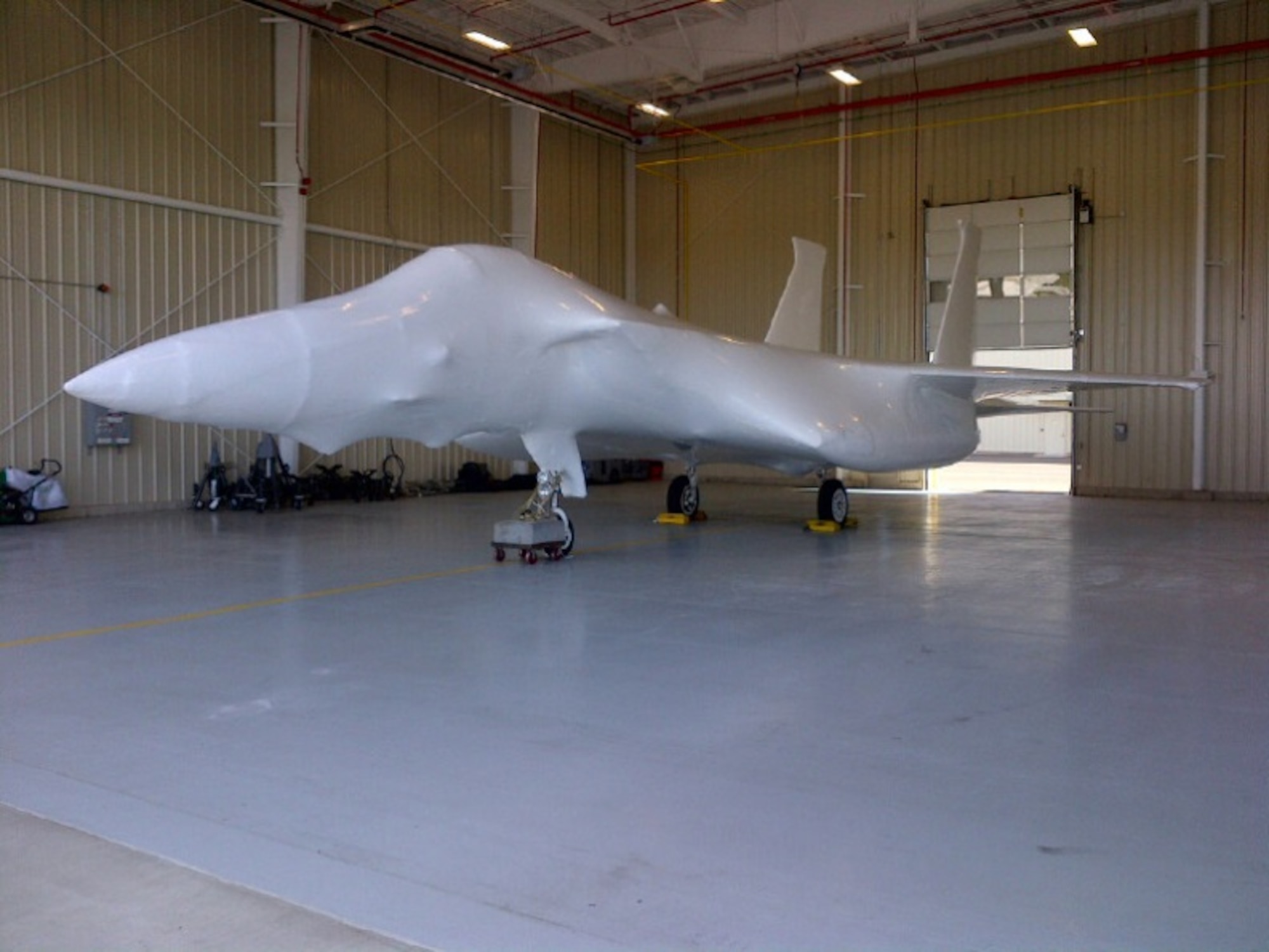 Atlantic Shrink Wrapping Inc. shrink wraps an F-15A Eagle for storage while a permanent location for this static display is selected and built.
(U.S. Air National Guard Photo by Chief Master Sgt. Wayne Brown/Released)