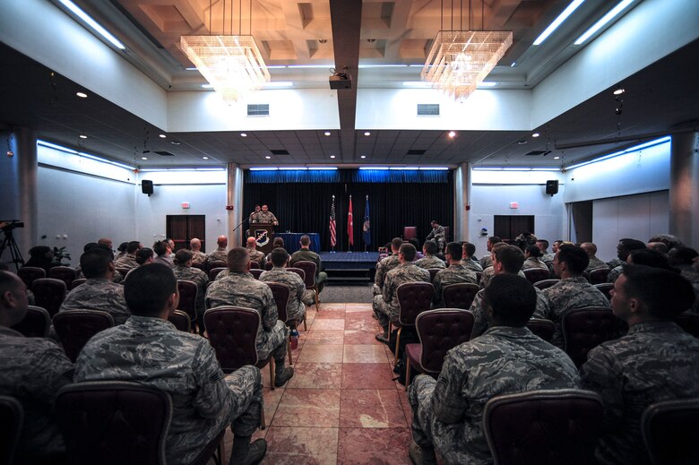 Airmen at Incirlik Air Base attend a retirement ceremony for Kira, 39th Security Forces Squadron military working dog, Oct. 27, 2014, Incirlik Air Base, Turkey.  As a narcotics K-9, Kira worked to keep the base free of narcotics. She will spend her retirement with Staff Sgt, Alexandra Woodlee, 39th MWD handler, after her adoption. (U.S. Air Force photo by Senior Airman Nicole Sikorski/Released)